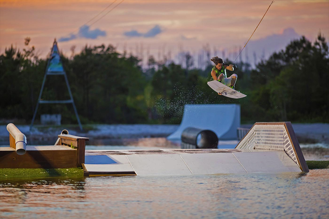 Man riding on a wakeboard at Shark Wake Park