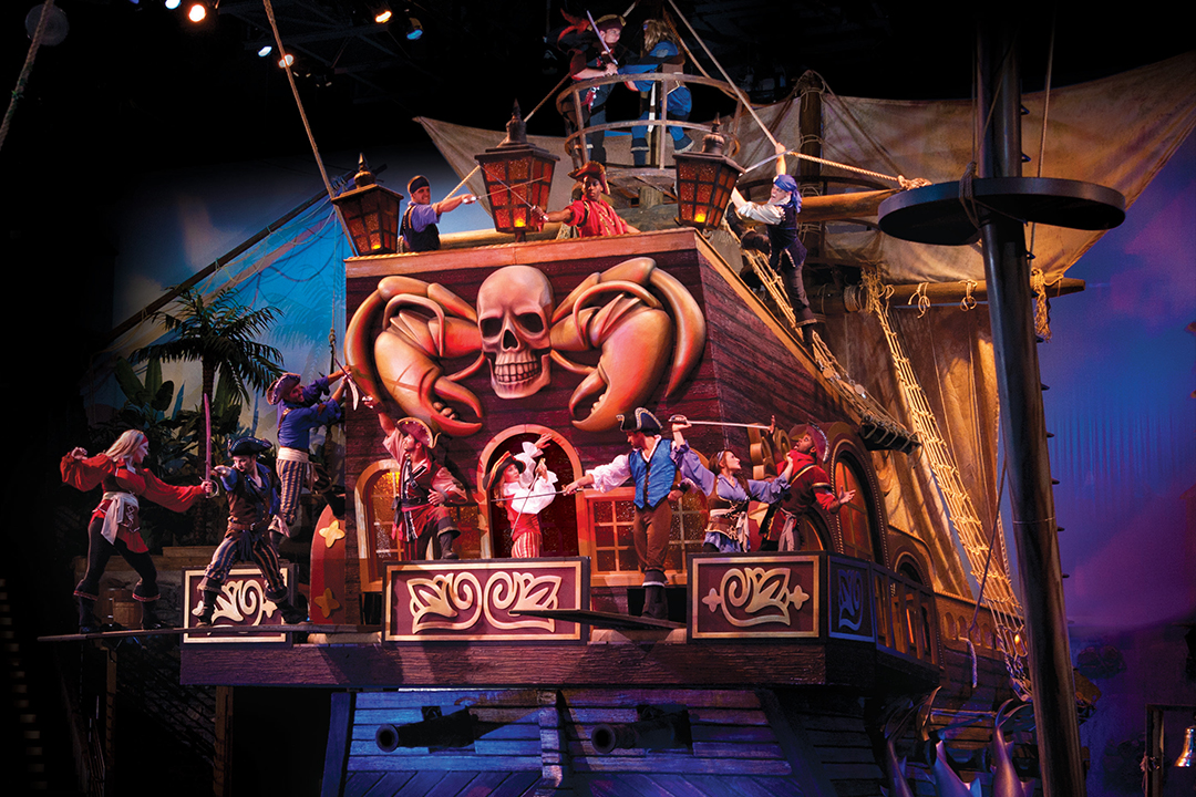 Performers on a pirate ship at Pirates Voyage