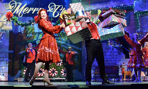 Performers on stage at a Christmas show