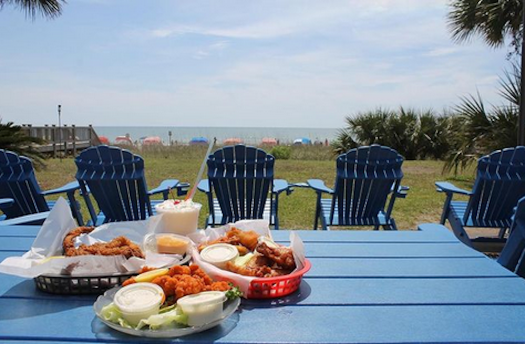 A picnic table by the beach