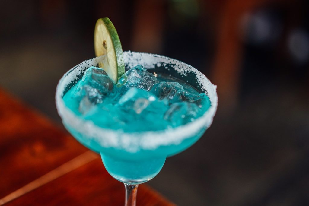Picture of a blue margarita on the bar