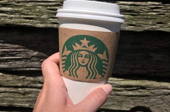Holding a Starbucks cup Holding a Starbucks cup
