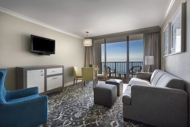 Oceanfront King Suite Living Room - Palms Building